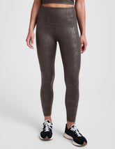 brown viper printed high-waisted midi length leggings.